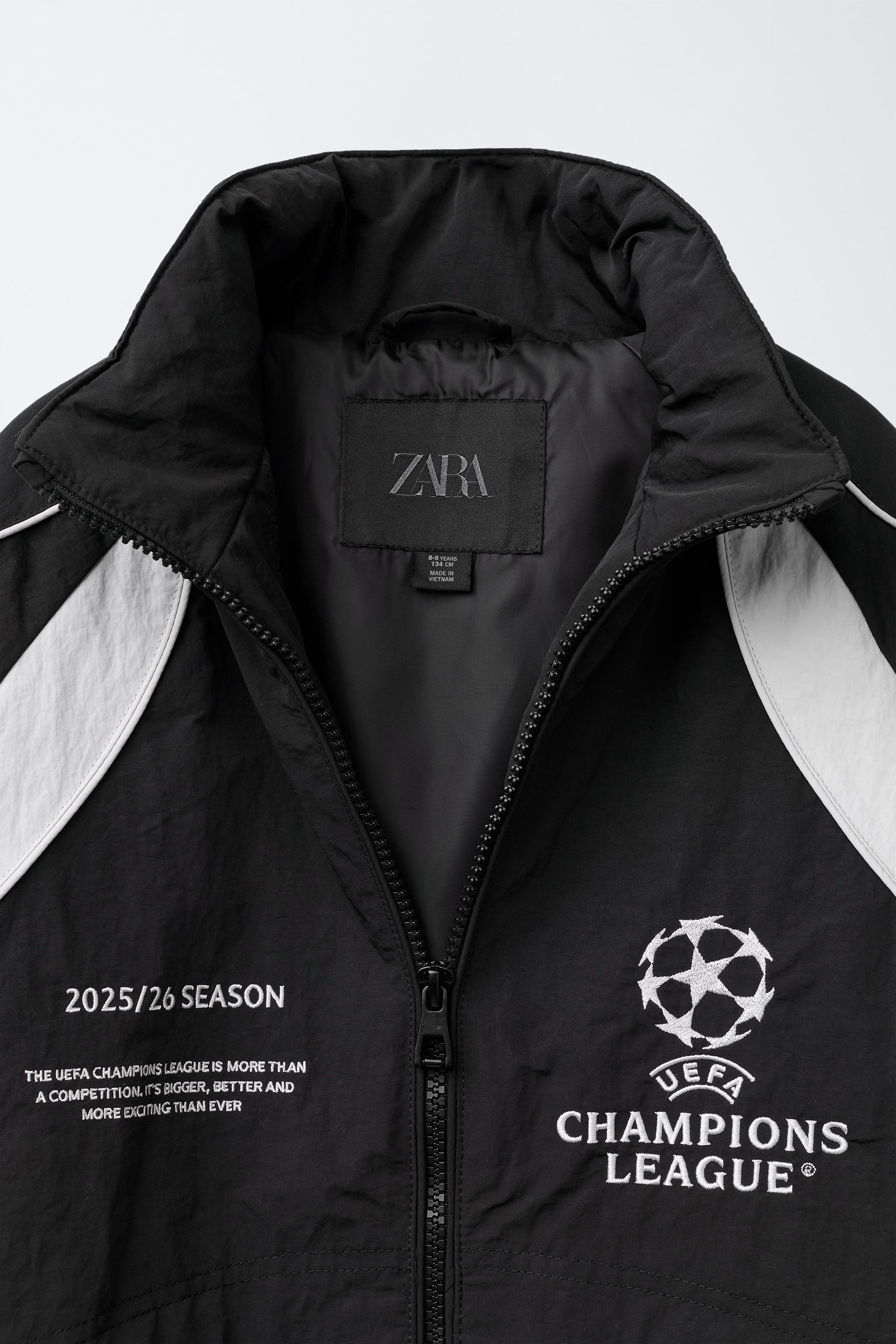 VESTE DÉPERLANTE À CAPUCHE UEFA CHAMPIONS LEAGUE ®